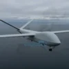 A dramatic aerial scene showing a sleek unmanned aerial vehicle (UAV) flying over the Baltic Sea region, with a subtle outline of the Baltic countries (Estonia, Latvia, Lithuania) in the background. The UAV is highlighted, while faint, abstract symbols of communication signals are missing or broken, indicating lack of notification. The sky is overcast with a hint of tension, and the scene conveys a sense of unnoticed intrusion without any text or logos.