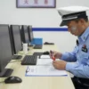 A police officer examining unmarked vape pens and snus on a table in a police station. The scene should be well-lit and show a sense of investigation.
