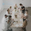 A diverse group of small business owners, representing various industries (e.g., a baker, a tech entrepreneur, a florist), collaborating around a table in a modern, bright office space. They are smiling and engaged in a discussion, symbolizing support and stability for small businesses.