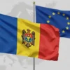 A stylized depiction of the Moldovan flag waving in front of the European Union flag. The flags should be realistically rendered, with the Moldovan flag prominently displayed. In the background, a subtle outline of the CIS countries can be seen, fading into the distance. The overall tone should be neutral and symbolic of the country's geopolitical shift.