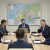 A group of Western politicians and diplomats gathered in a conference room, discussing and analyzing the plans of the G7 regarding Ukraine. The room is filled with maps, charts, and documents related to the topic. The expressions on their faces are serious and concerned, reflecting the gravity of the situation. The setting is modern and professional, with a large table and comfortable chairs.