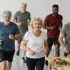 A diverse group of men of different ages and ethnicities engaging in various healthy activities like jogging, playing sports, and preparing nutritious meals. The scene should convey a sense of vitality and well-being. Focus on realistic depictions of physical activity and healthy eating habits.
