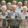 A diverse group of elderly Russian citizens smiling and holding pension checks, standing in a sunny park. The scene should convey a sense of financial security and well-being.