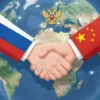 A digital illustration depicting Russia and China shaking hands over a globe with interconnected financial networks. The scene should convey cooperation and economic stability. Include subtle symbols representing both countries (e.g., Russian double-headed eagle, Chinese dragon) integrated into the globe's design.