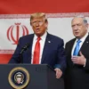 A dramatic political scene showing former US President Donald Trump speaking on a podium with a microphone, standing beside Israeli Prime Minister Benjamin Netanyahu who is gesturing as if urging restraint, with a large Iranian flag in the background and a subtle hint of a military map or missile silhouette to suggest tensions over Iran, all rendered in a realistic political illustration style