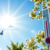 A bright summer day in Voronezh region with a clear blue sky and a thermometer showing 30 degrees Celsius, no text or numbers on the image