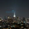 A wide shot of a cityscape at night, with several streaks of light representing intercepted drones visible in the sky. The city lights should be prominent, and the intercepted drones should be depicted as abstract trails of light.