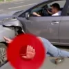 A driver of a Subaru car hitting a pedestrian on a sidewalk in Volgograd, with the car partially on the sidewalk and the pedestrian being struck, realistic depiction of the accident scene without any text, letters, or digits on the image