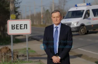 A Russian official in a formal suit standing beside a pothole-filled road near a sign reading 'Пер' (Per), with a concerned expression and a government vehicle parked nearby