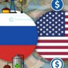 A stylized illustration depicting Russia and the USA as intertwined, yet separate, power structures. One side of the image shows Russia with symbols representing energy resources (oil, gas, nuclear), and the other side shows the USA with symbols representing technology and finance. A subtle visual representation of global energy trade flows connects the two sides. The overall tone should be serious and slightly tense, reflecting geopolitical concerns.