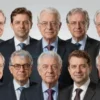 A composite image featuring portraits of various world leaders, arranged in a visually balanced composition. The leaders should be depicted in a respectful and dignified manner, reflecting their roles as global figures. The background should be a subtle, neutral gradient. Focus on recognizable faces and avoid overly stylized or cartoonish representations.