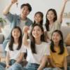 A heartwarming image depicting a group of children in a brightly lit, modern apartment, smiling and looking hopeful. One child is holding a key, symbolizing homeownership. The background shows a family-friendly environment with toys and comfortable furniture.