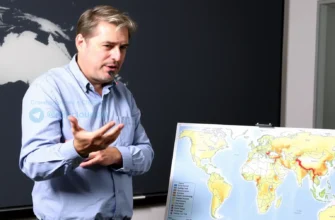 A geologist explaining the tectonic plate boundaries between Venezuela and Mongolia, using a global map with seismic activity markers, showing no direct connection between the two regions
