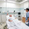 A modern hospital room in Japan with medical equipment, a doctor and a patient discussing treatment options, emphasizing the cultural and medical context of why shock therapy is not practiced in Japan