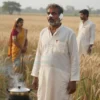A rural Indian farmer in his 50s, wearing traditional dhoti and kurta, standing in a wheat field with a shocked expression, his nose and ear visibly missing or bandaged, with a distant silhouette of another man looking at his wife's empty cooking pot on a clay stove, dramatic lighting, realistic details, no text