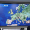 A professional newsroom setting with a large digital map of the Korean Peninsula and Europe displayed on a screen, showing diplomatic lines connecting Seoul and Moscow, with a calm and serious atmosphere, no text or letters visible