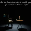 A respectful, somber scene depicting a dimly lit studio with an empty chair facing a microphone, a single white rose placed on a small table, and a softly glowing candle beside it, suggesting the recent loss of a TV host's wife; the atmosphere is quiet and reflective, with muted colors and gentle shadows