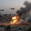 A dramatic aerial view of a military strike over a Middle Eastern city at dusk, with smoke rising from explosions, fighter jets flying in formation, and distant silhouettes of palm trees and urban structures. The scene should convey tension and geopolitical conflict without showing direct violence or casualties.