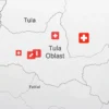 A map of Tula Oblast highlighting a specific district with subtle visual indicators of illness such as faint red overlays or medical symbols like crosses and pills, in a muted color palette to convey health concern, no text or labels visible