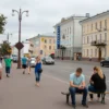 A bustling city scene in Ulyanovsk, Russia, with people going about their daily lives, showing a sense of calm and normalcy despite the title's implication of panic. The image should capture the essence of urban life with buildings, streets, and various activities.