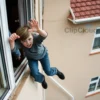 A young boy falling out of a fourth-floor window in a residential area, with a focus on the moment of impact, showing the boy's expression of fear and the surrounding environment, including the building, window, and ground below