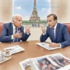 A digitally painted illustration depicting a tense political meeting between Joe Biden and Emmanuel Macron. Biden is seated at a large table, looking concerned. Macron is standing, gesturing emphatically. The background shows a blurred image of the White House and the Eiffel Tower. The overall mood is serious and slightly confrontational.