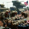 A group of American soldiers receiving medical attention in a field hospital setting, with injured personnel being treated by medical staff, military vehicles and equipment in the background, realistic and detailed