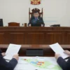 A courtroom scene with two opposing parties: one representing the Tulskoye Miniinost (municipal property) and the other representing the LLC TK 'Venetia'. The scene should depict a legal dispute over property rights, with lawyers presenting documents and a judge overseeing the proceedings. Include a detailed courtroom interior with a judge's bench, witness stand, and audience. Show a large map or blueprint of the disputed property on a table. Use a realistic and professional atmosphere with appr