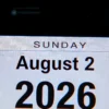 A calendar page showing Sunday, August 2, 2026, with a clean and minimal design. The date should be prominently displayed in a modern font, with the day of the week and date clearly visible. The background should be neutral, such as white or light gray, with subtle decorative elements like faint lines or a soft gradient to indicate a calendar layout. No text, letters, or digits should be added beyond the date and day of the week.