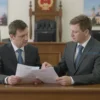A realistic courtroom scene in Tula, Russia, showing a middle-aged man in a business suit (representing Gleb Zotov) presenting legal documents to a judge, with a courtroom backdrop featuring a judge's bench, a legal desk, and a Tula city landmark subtly visible in the background. The scene should convey a formal legal proceeding without any visible text or signage.
